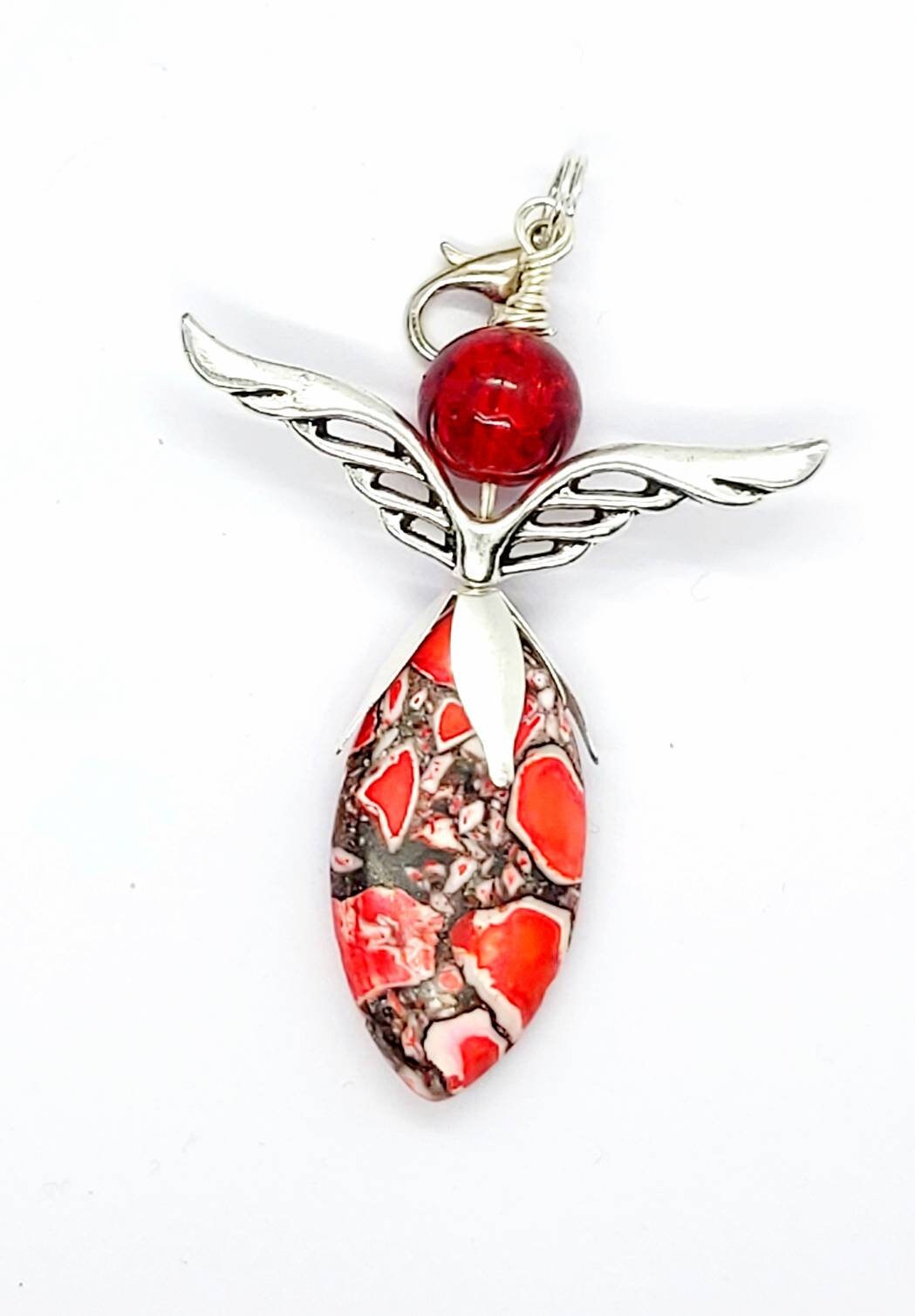 Angel pendant made of marbled natural stone beads
