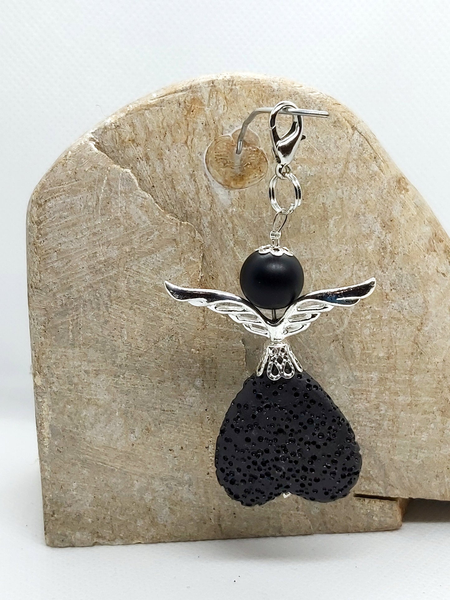 Angel pendant made of onyx and lava stone